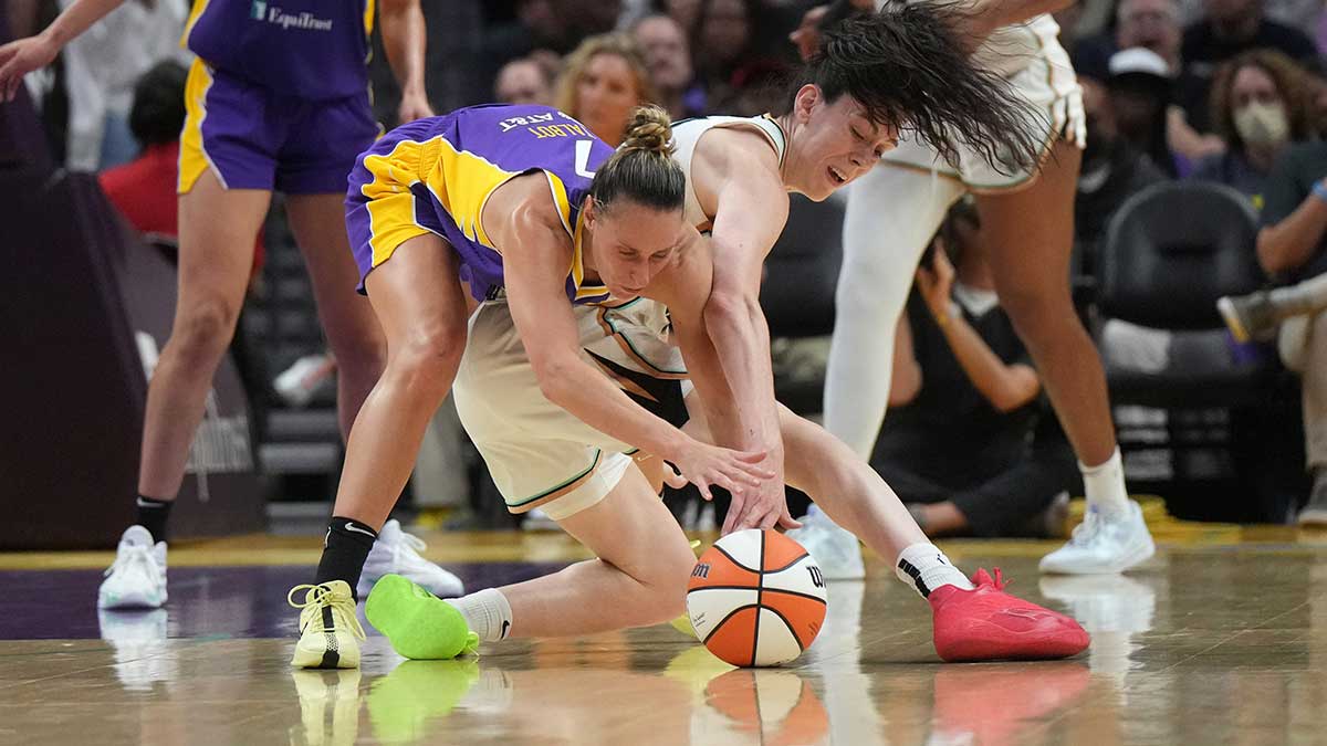 LA Sparks forward Stephanie Talbot (7) and New York Liberty forward Breanna Stewart (30) battle for the ball in the second half at Crypto.com Arena.