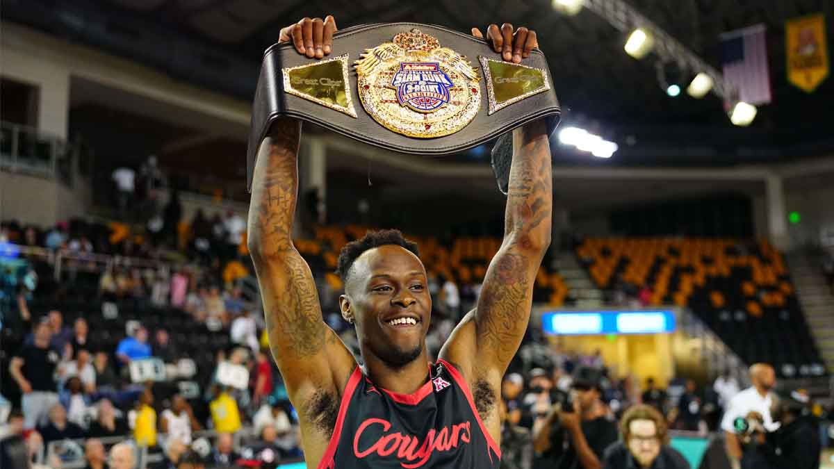 Houston Cougars guard Taze Moore (4) celebrates after his win at the Convocation Center.