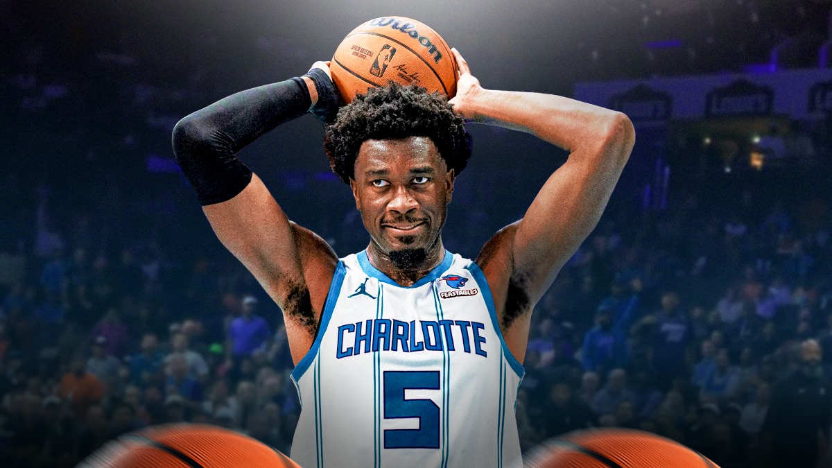 Charlotte Hornets player Mark Williams with the Charlotte Hornets arena in the background, injury season