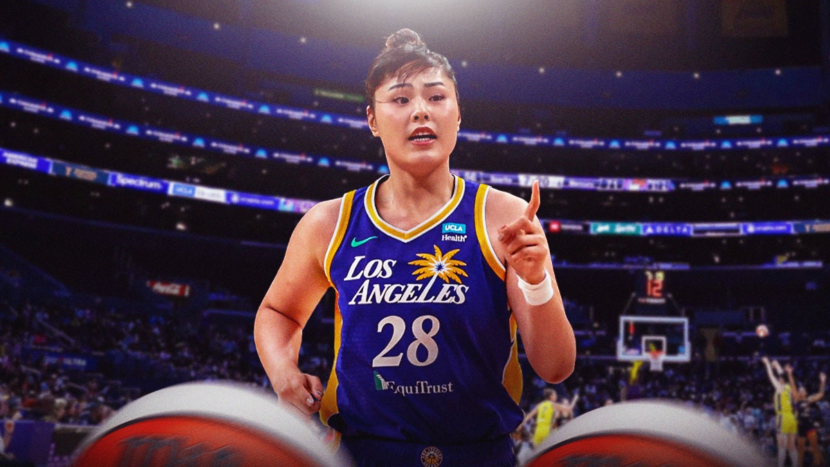 LA Sparks player Li Yueru with the LA Sparks arena in the background, WNBA season
