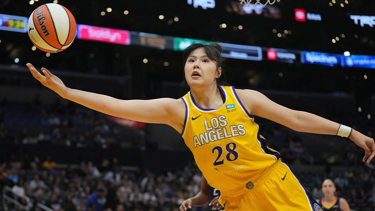 LA Sparks center Li Yueru (28) reaches for the ball against the Phoenix Mercury in the second half at Crypto.com Arena.