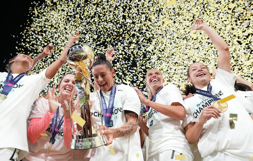 Nov 11, 2023; San Diego, California, USA; New Jersey/New York Gotham FC defender Ali Krieger (11) hoists the trophy with her teammates after defeating the OL Reign in the NWSL Championship at Snapdragon Stadium. Mandatory Credit: Kyle Terada-Imagn Images