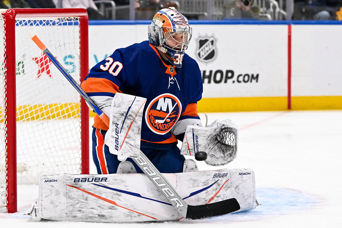 New York Islanders goaltender Ilya Sorokin (30) makes a save against the Pittsburgh Penguins during the third period at UBS Arena.