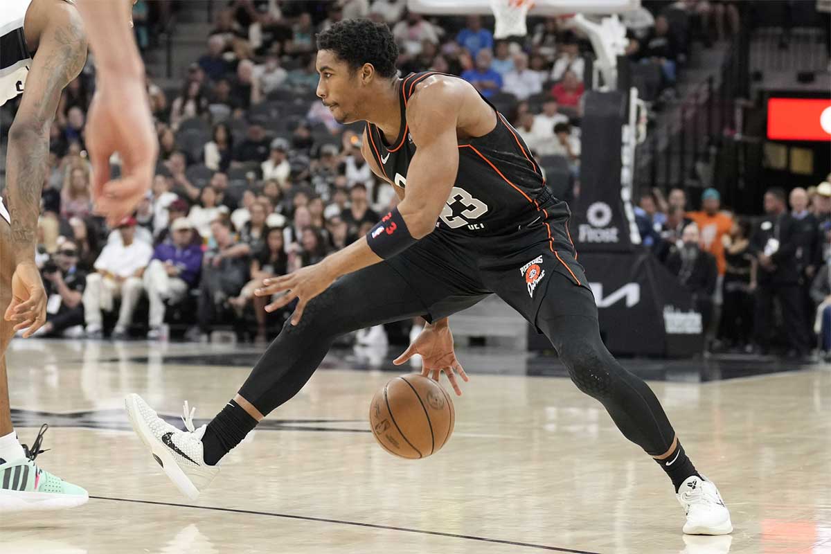 Detroit Pistons guard Jaden Ivey (23) looks to pass the ball during the first half against the San Antonio Spurs at Frost Bank Center. 