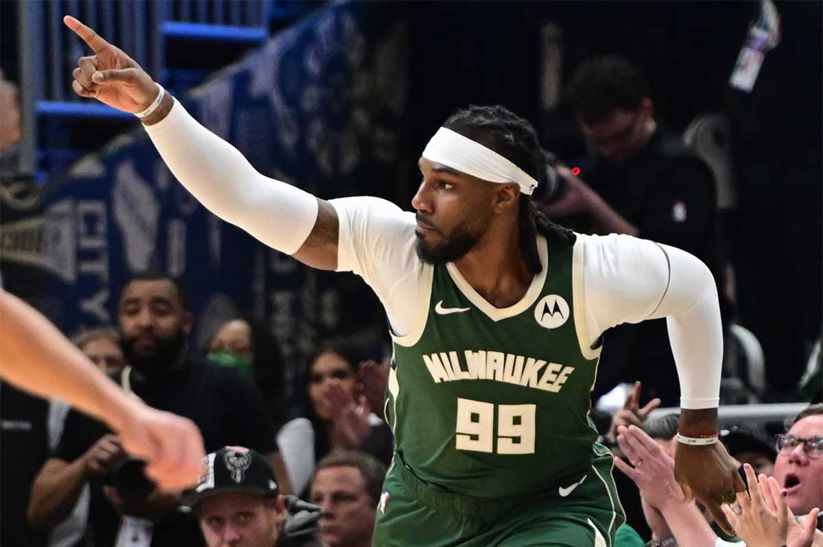 Milwaukee Bucks forward Jae Crowder (99) reacts after scoring a basket in the third quarter against the Indiana Pacers during game one of the first round for the 2024 NBA playoffs at Fiserv Forum.