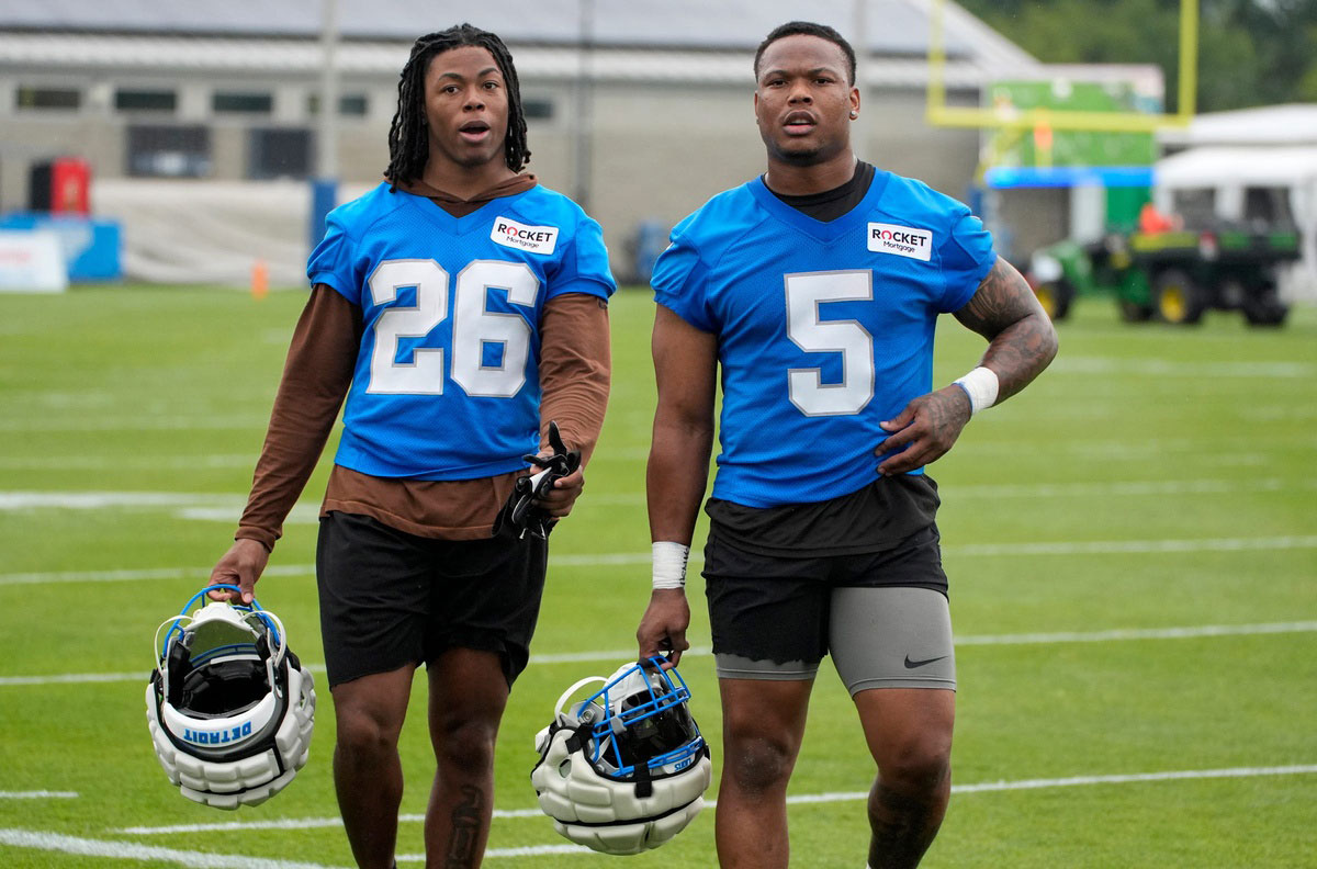 (L to R) Detroit Lions running backs Jahmyr Gibbs and David Montgomery talk while heading off the practice field at the Detroit Lions practice facility in Allen Park on Wednesday, July 24, 2024