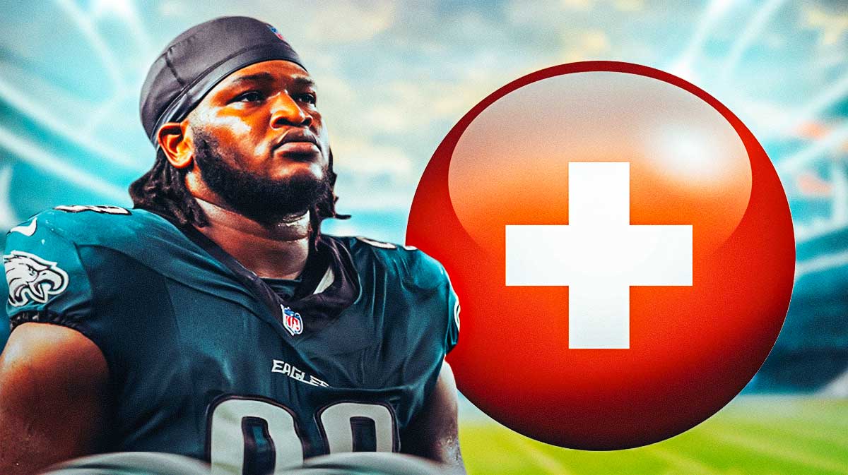 Jalen Carter in Eagles uniform with medical Red Cross symbol
