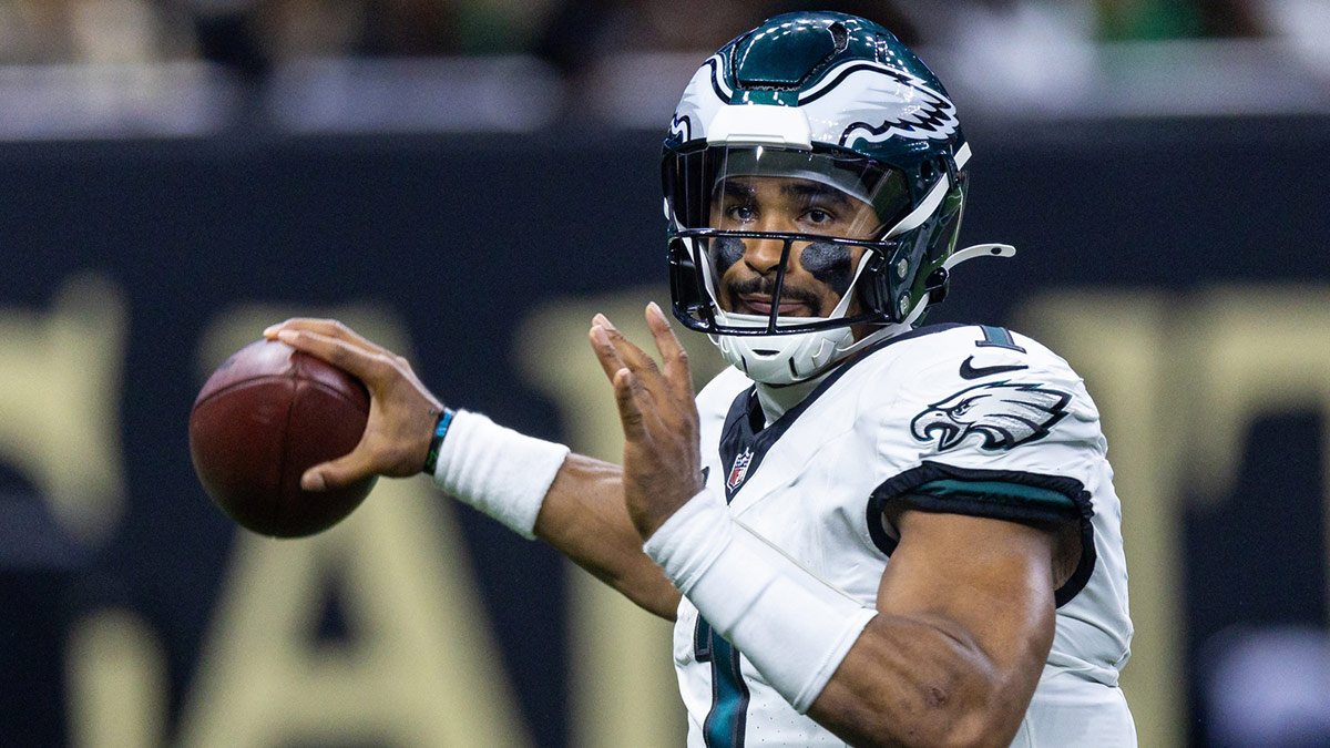 Philadelphia Eagles quarterback Jalen Hurts (1) passes against the New Orleans Saints during the first half at Caesars Superdome. 