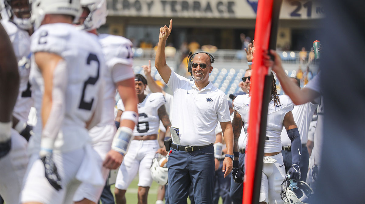 Penn State Nittany Lions head coach James Franklin smiles after a touchdown during the second quarter and calls for an extra point against the West Virginia Mountaineers at Mountaineer Field at Milan Puskar Stadium.