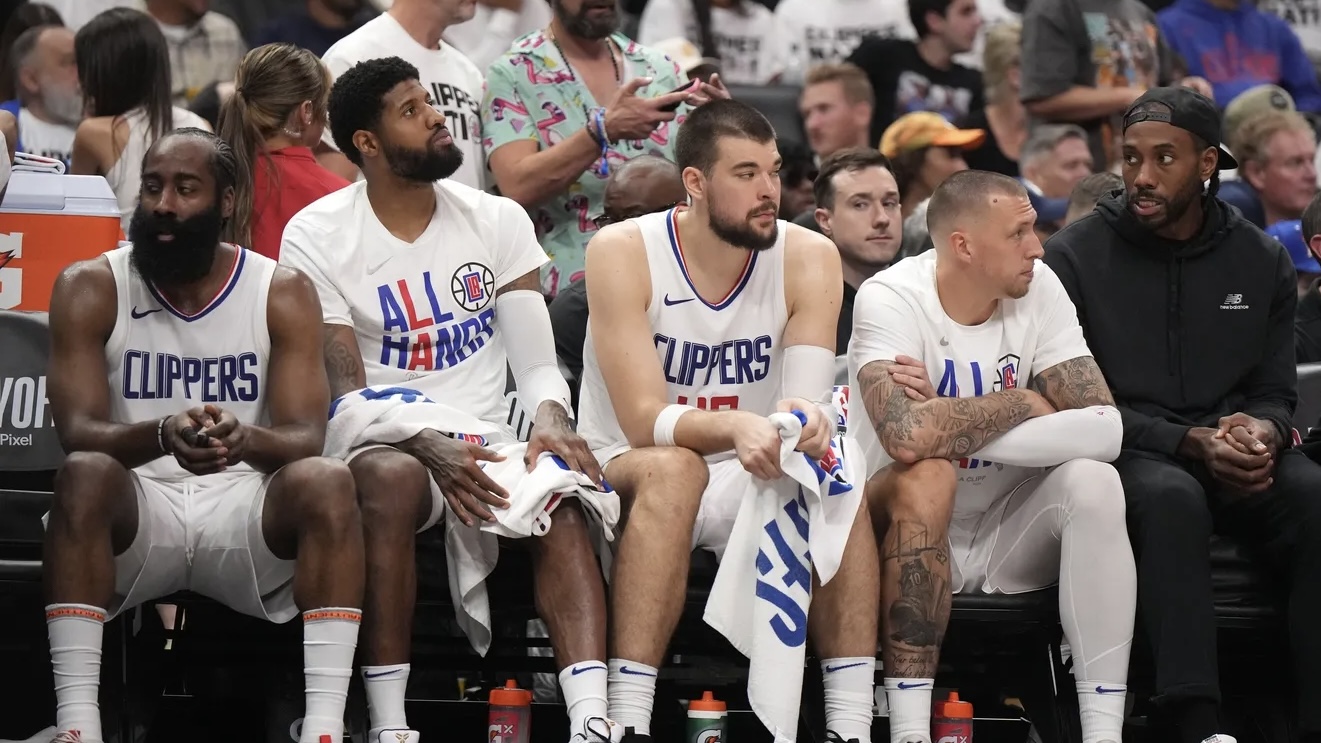 Los Angeles, California, USA; LA Clippers guard James Harden (1), forward Paul George (13), center Ivica Zubac (40), center Daniel Theis (10) and forward Kawhi Leonard (2) react in the second half during game five of the first round for the 2024 NBA playoffs at Crypto.com Arena.