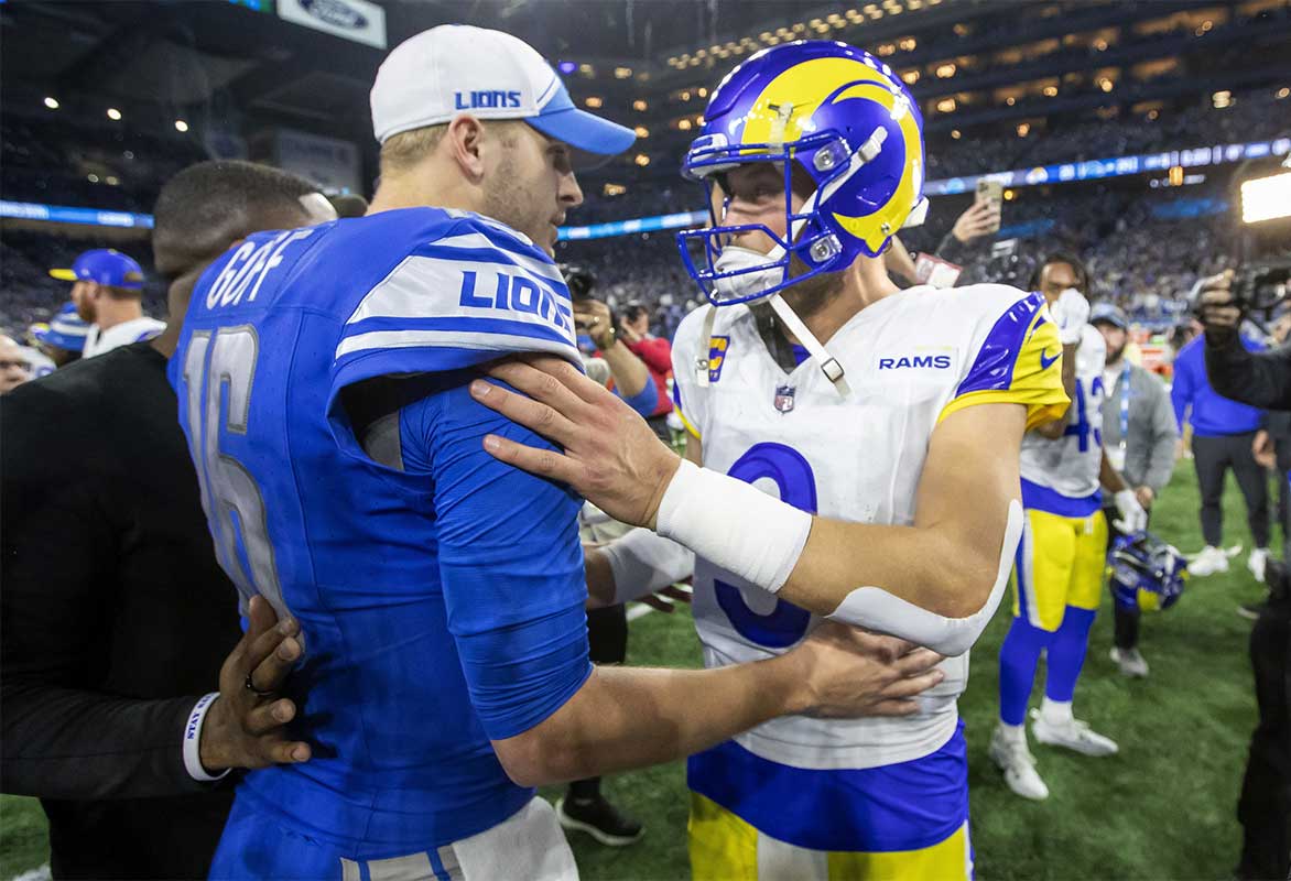 Detroit Lions quarterback Jared Goff (16) and Los Angeles Rams quarterback Matthew Stafford (9) greet each other after a 2024 NFC wild card game at Ford Field.