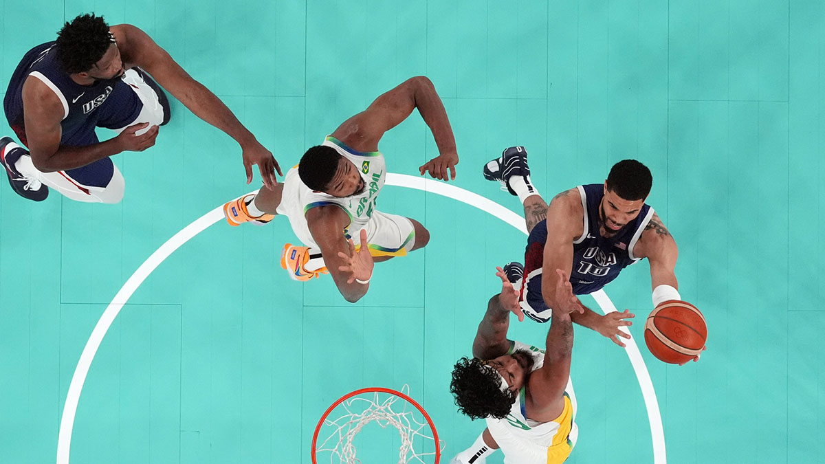 United States small forward Jayson Tatum (10) shoots against Brazil power forward Lucas Dias (99) in the second half in a men’s basketball quarterfinal game during the Paris 2024 Olympic Summer Games at Accor Arena.