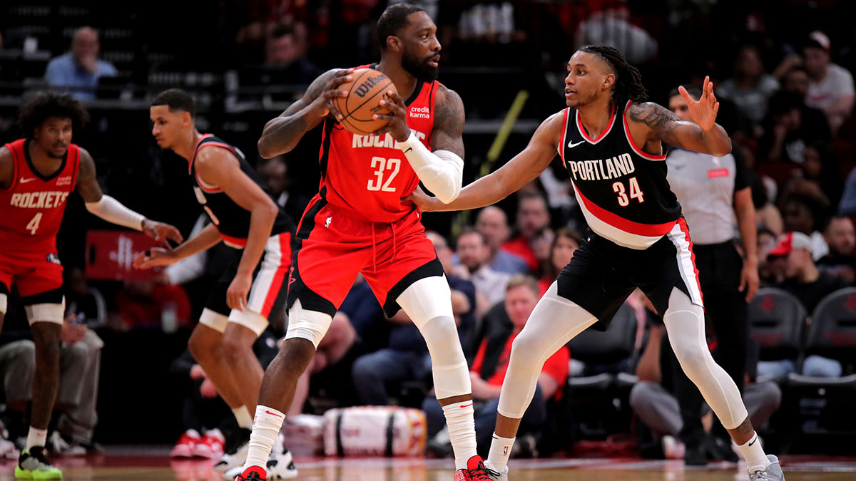 Houston Rockets forward Jeff Green (32) handles the ball against Portland Trail Blazers forward Jabari Walker (34) during the fourth quarter at Toyota Center