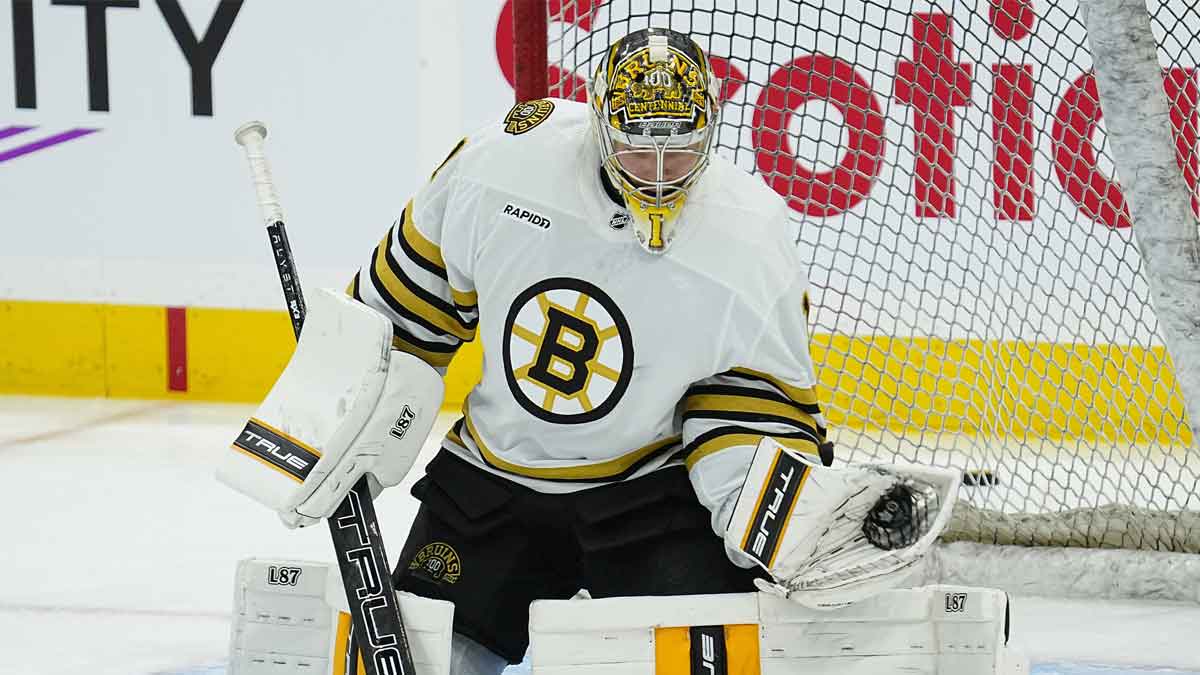 Boston Bruins goaltender Jeremy Swayman (1) makes a save during warm-up of game three of the first round of the 2024 Stanley Cup Playoffs against the Toronto Maple Leafs at Scotiabank Arena.