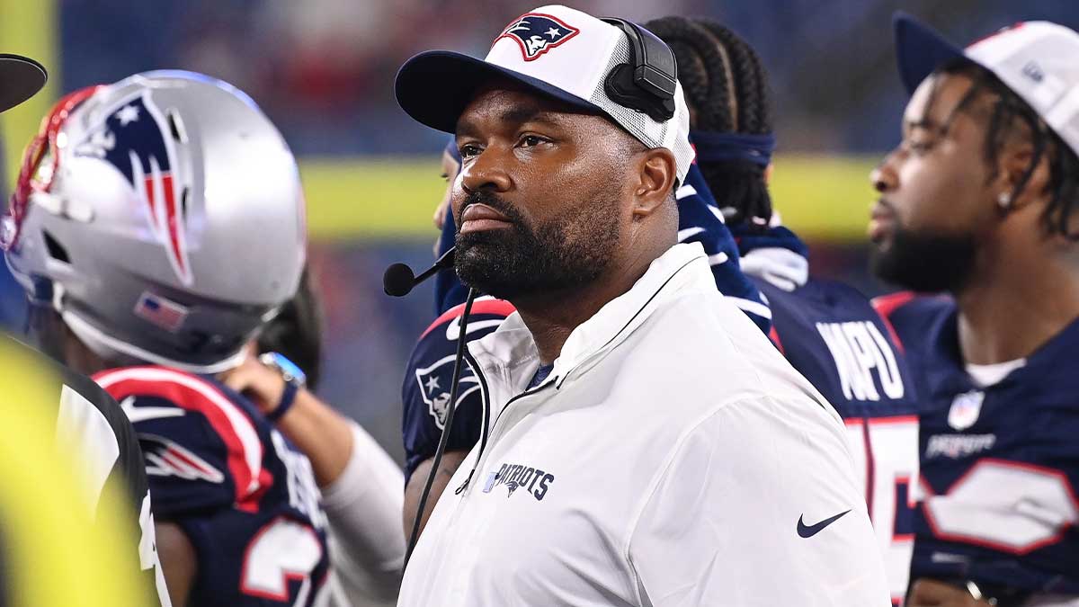 New England Patriots head coach Jerod Mayo watches the video boards after challenging a call on the field during the second half against the Carolina Panthers at Gillette Stadium.