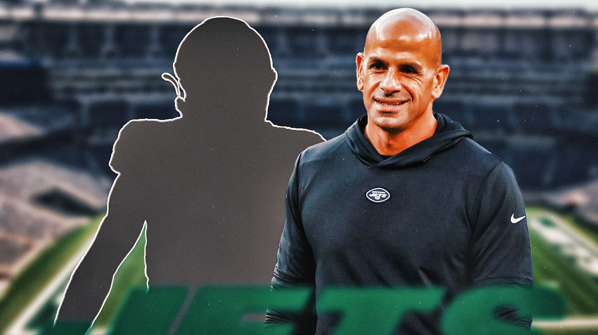 Silhouette of Kene Nwangwu next to a smiling Jets coach Robert Saleh.