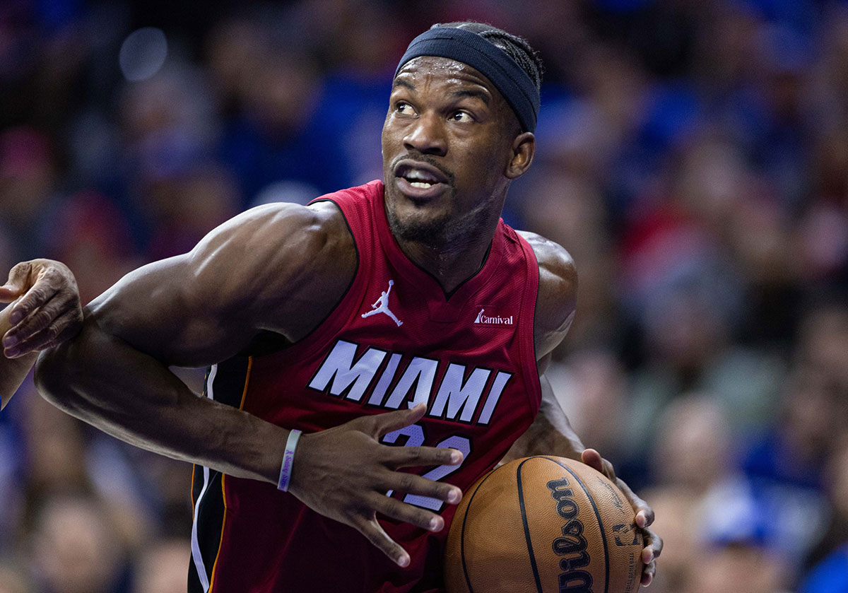 Miami Heat forward Jimmy Butler (22) drives against against the Philadelphia 76ers during the first quarter of a play-in game of the 2024 NBA playoffs at Wells Fargo Center.