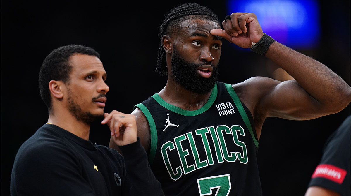 Boston Celtics head coach Joe Mazzulla talks with guard Jaylen Brown (7) from the sideline as they take on the Indiana Pacers during game two of the eastern conference finals for the 2024 NBA playoffs at TD Garden. 