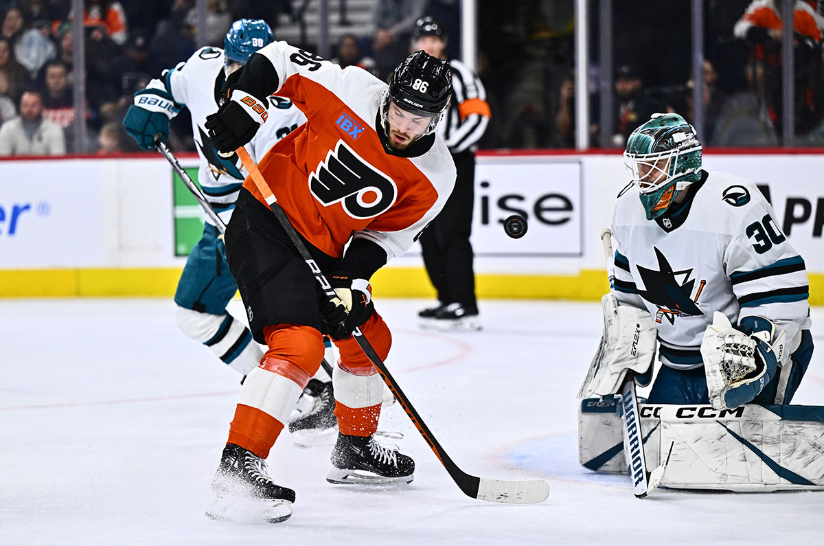 Philadelphia Flyers left wing Joel Farabee (86) deflects the puck against San Jose Sharks goalie Magnus Chrona (30) in the third period at Wells Fargo Center.