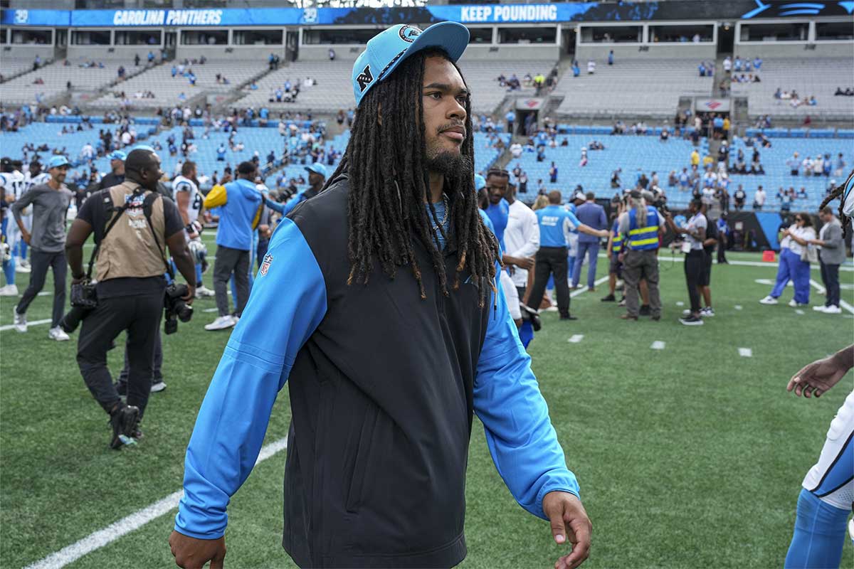 Carolina Panthers running back Jonathon Brooks (24) walks off the field after the second half against the Los Angeles Chargers at Bank of America Stadium