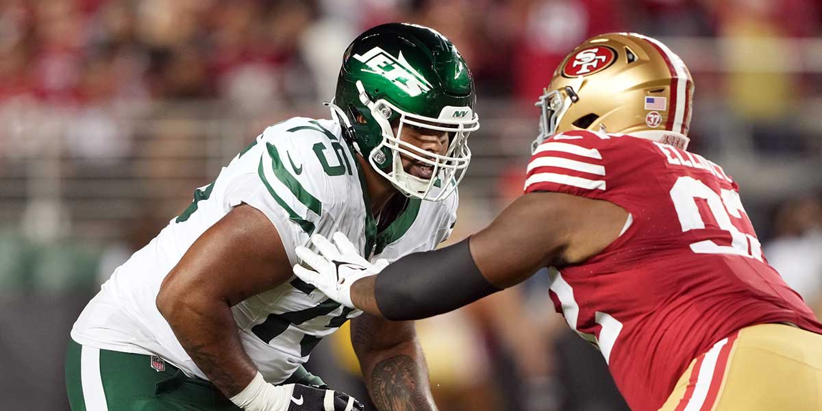 Sep 9, 2024; Santa Clara, California, USA; New York Jets guard Alijah Vera-Tucker (75) blocks against San Francisco 49ers defensive tackle Jordan Elliott (right) during the fourth quarter at Levi's Stadium. 