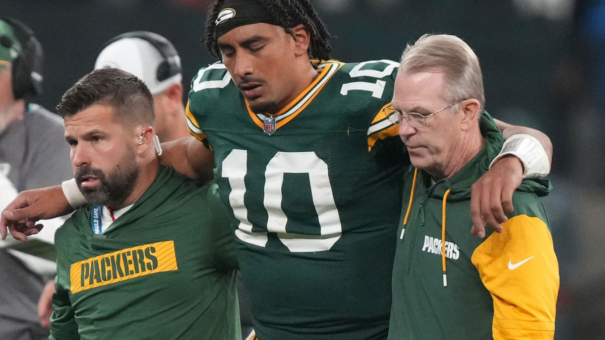 Sep 6, 2024; Sao Paulo, BRA; Green Bay Packers quarterback Jordan Love (10) is assisted off the field after an injury during the second half against the Philadelphia Eagles at Neo Quimica Arena.