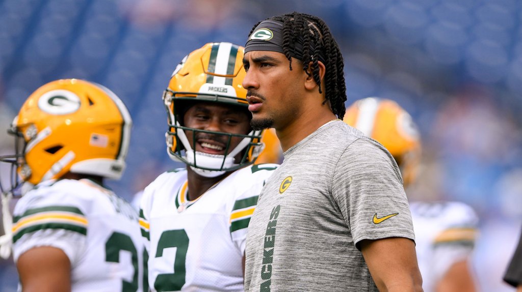 Green Bay Packers quarterback Jordan Love (10) and Green Bay Packers quarterback Malik Willis (2) look on during pregame warmups before the game against the Tennessee Titans at Nissan Stadium. 