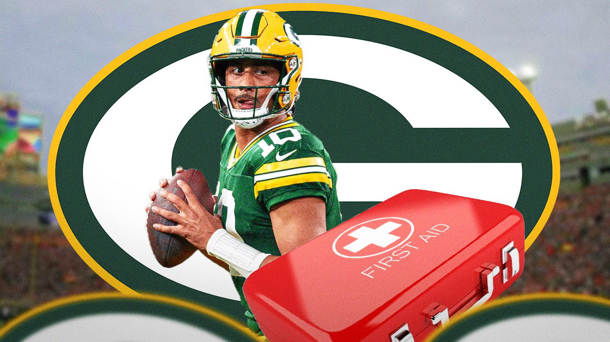 Photo: Jordan Love in action in Packers jersey with medical kit beside him