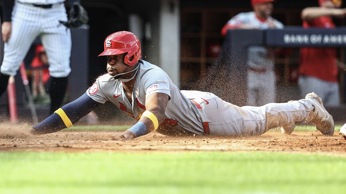 St. Louis Cardinals right fielder Jordan Walker (18) slides safely into home plate in the seventh inning against the New York Yankees at Yankee Stadium.