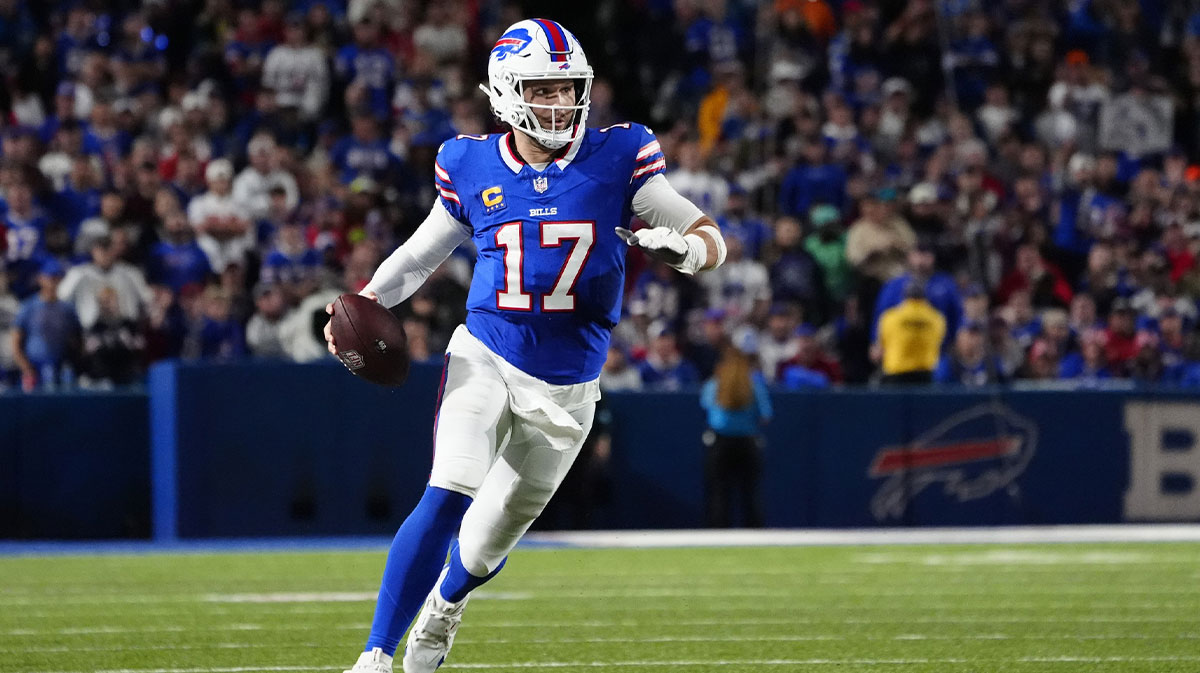 Sep 23, 2024; Orchard Park, New York, USA; Buffalo Bills quarterback Josh Allen (17) runs against the Jacksonville Jaguars during the second half at Highmark Stadium.