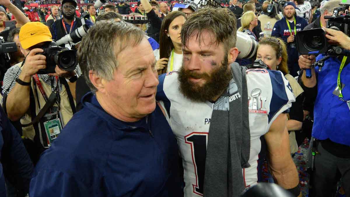 Feb 5, 2017; Houston, TX, USA; New England Patriots head coach Bill Belichick celebrates with wide receiver Julian Edelman (11) after defeating the Atlanta Falcons 34-28 in overtime during Super Bowl LI at NRG Stadium.