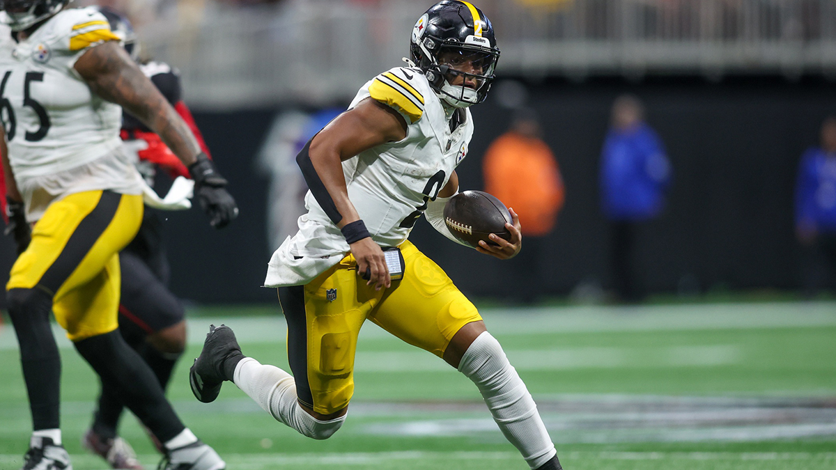 Sep 8, 2024; Atlanta, Georgia, USA; Pittsburgh Steelers quarterback Justin Fields (2) runs the ball against the Atlanta Falcons in the third quarter at Mercedes-Benz Stadium.