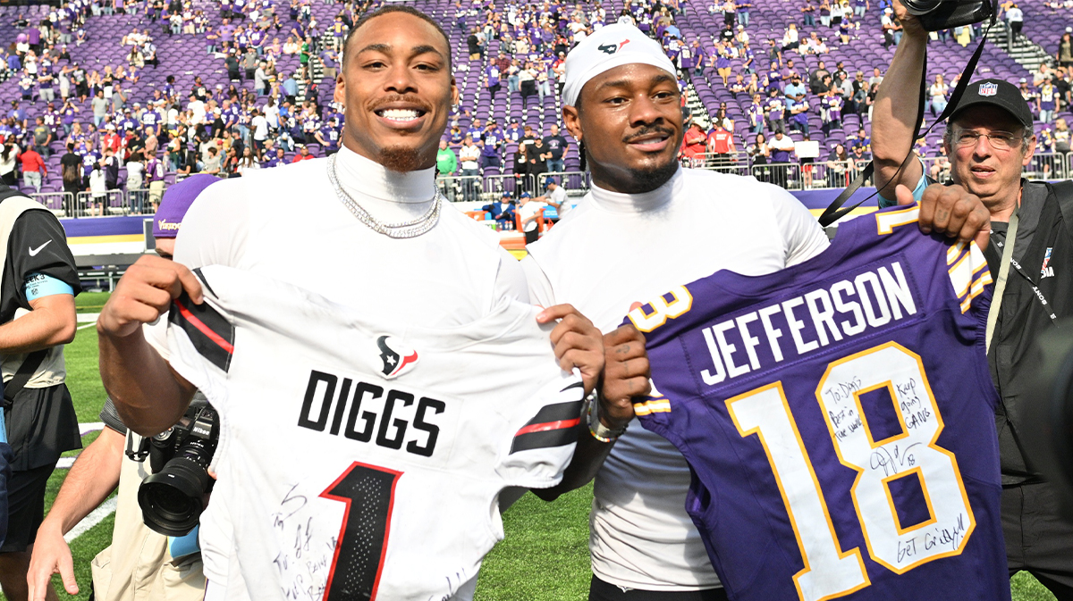 Minnesota Vikings wide receiver Justin Jefferson (18) and Houston Texans wide receiver Stefon Diggs (1) exchange jerseys after the game at U.S. Bank Stadium.