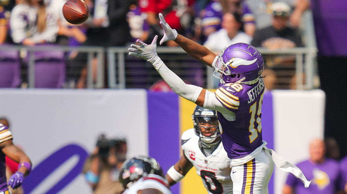 Minnesota Vikings wide receiver Justin Jefferson (18) catches a pass against the Houston Texans in the second quarter at U.S. Bank Stadium.