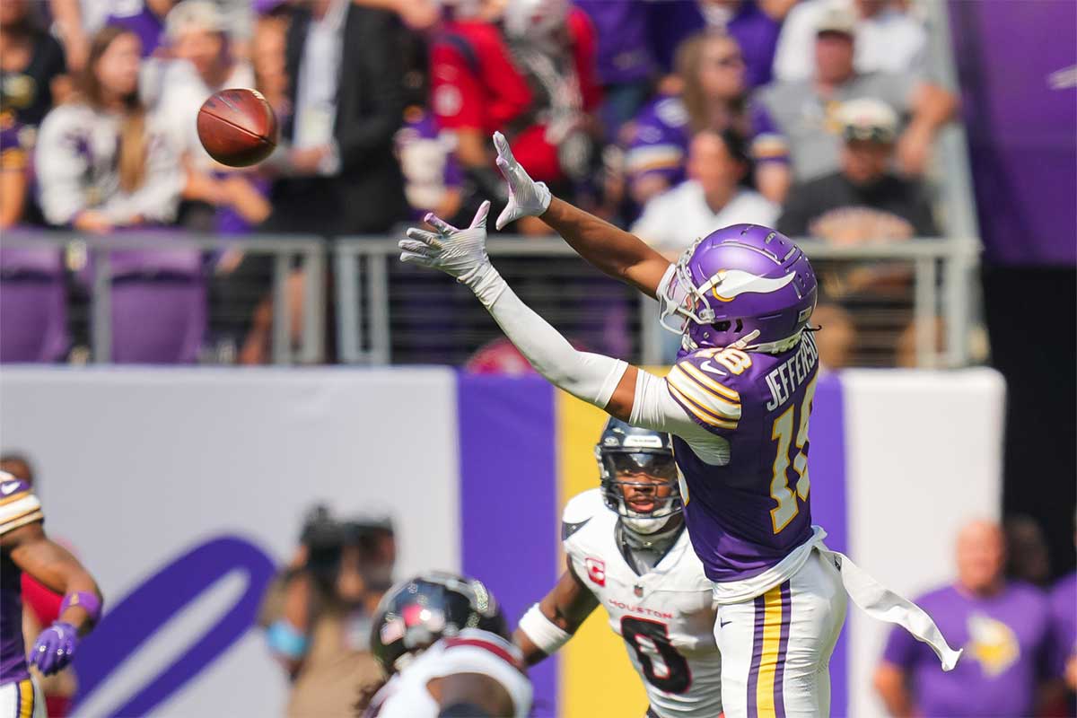 Minnesota Vikings wide receiver Justin Jefferson (18) catches a pass against the Houston Texans in the second quarter at U.S. Bank Stadium.