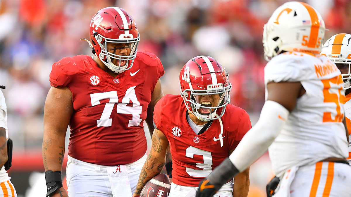 Alabama wide receiver Jermaine Burton (3) and offensive lineman Kadyn Proctor (74) celebrate after a play against Tennessee.