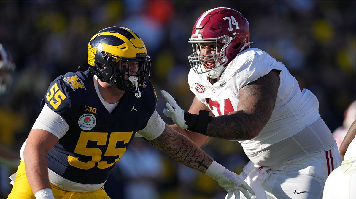 Alabama Crimson Tide offensive lineman Kadyn Proctor (74) blocks Michigan Wolverines defensive lineman Mason Graham (55) during the first half in the 2024 Rose Bowl college football playoff semifinal game at Rose Bowl.