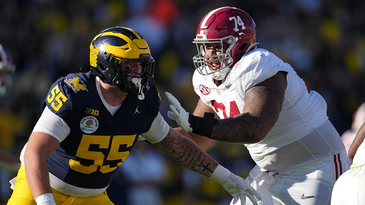 Alabama Crimson Tide offensive lineman Kadyn Proctor (74) blocks Michigan Wolverines defensive lineman Mason Graham (55) during the first half in the 2024 Rose Bowl college football playoff semifinal game at Rose Bowl.