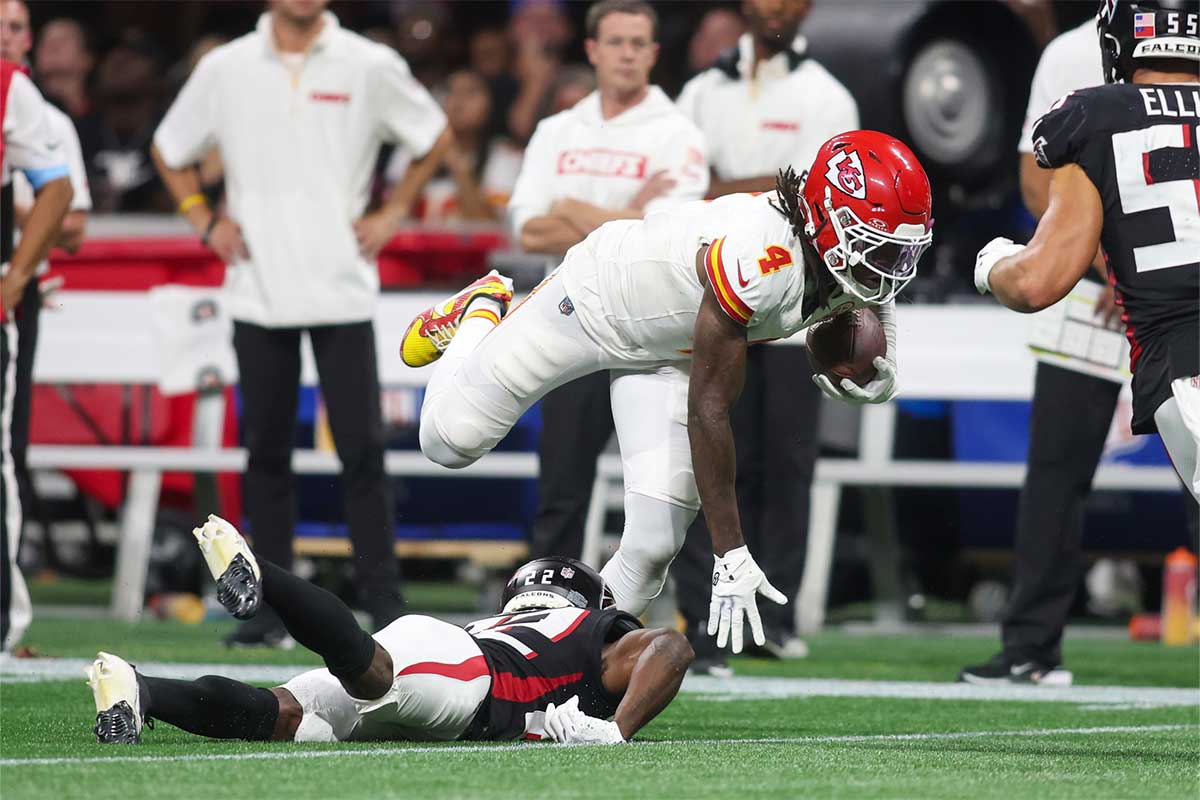 Kansas City Chiefs wide receiver Rashee Rice (4) runs after a catch against the Atlanta Falcons in the second quarter at Mercedes-Benz Stadium.