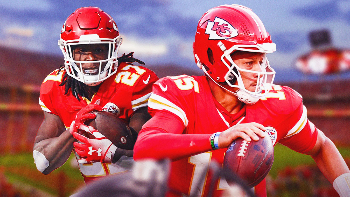 Kareem Hunt in his Chiefs uniform next to Patrick Mahomes in front of the Chiefs' stadium.