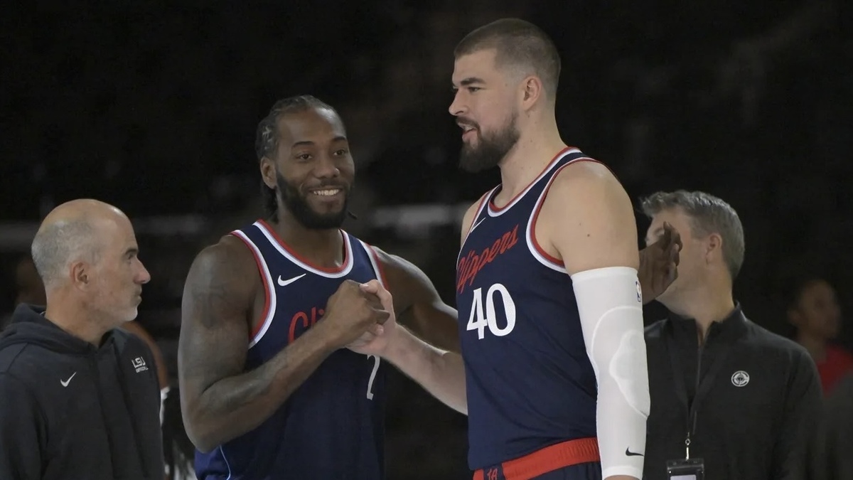 Los Angeles Clippers forward Kawhi Leonard (2) and center Ivica Zubac (40) during media day at Intuit Dome.
