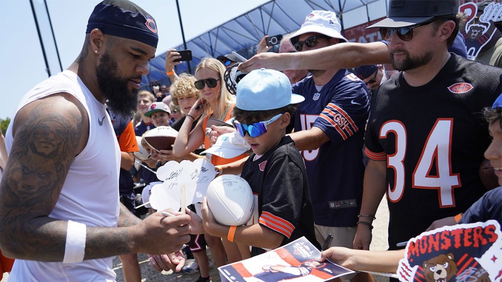 Chicago Bears wide receiver Keenan Allen (13) signs autographs during Chicago Bears Training Camp at Halas Hall.