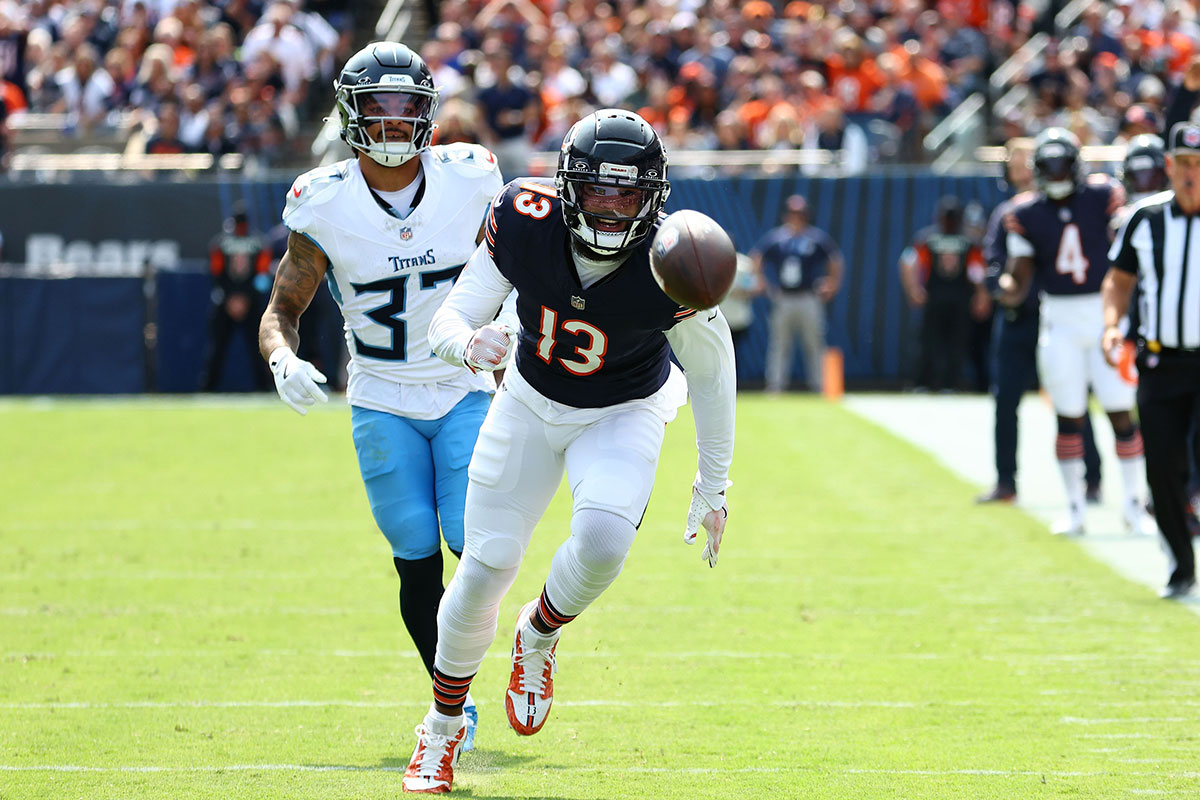 Chicago Bears wide receiver Keenan Allen (13) tries to catch a ball against Tennessee Titans safety Amani Hooker (37) during the second half at Soldier Field.