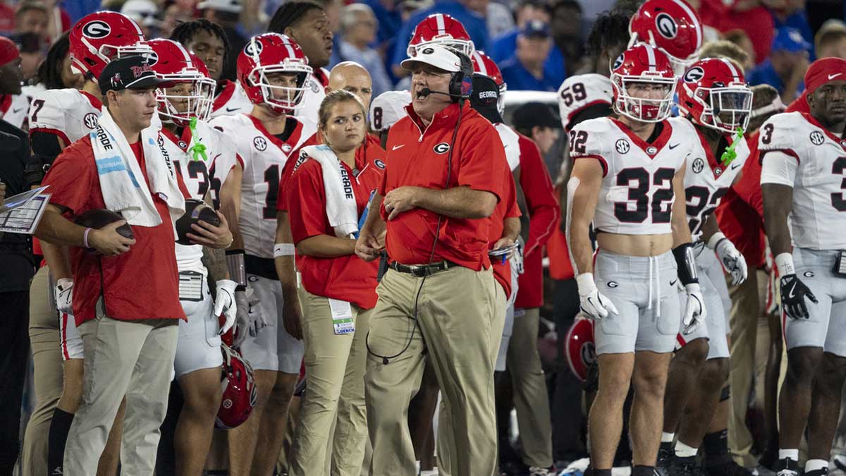 Georgia Bulldogs head coach Kirby Smart walks down the sideline during the first quarter against the Kentucky Wildcats at Kroger Field.