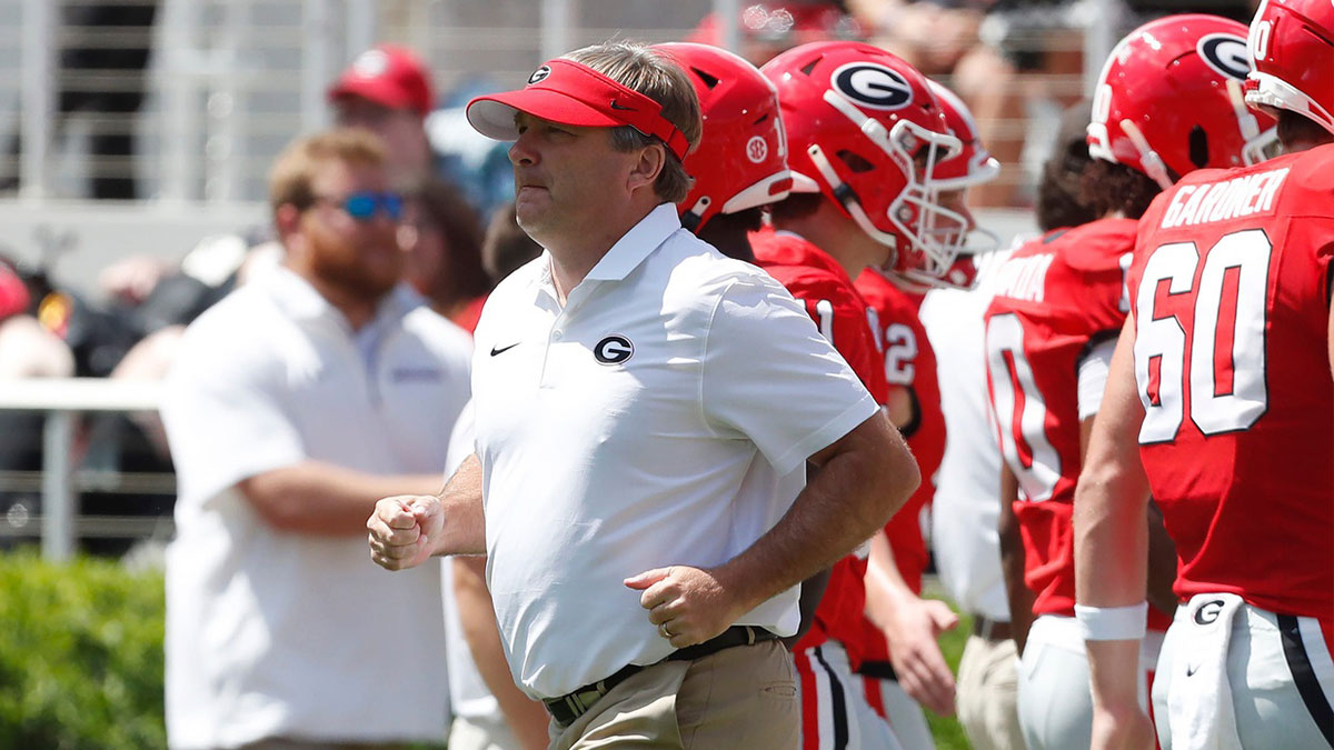 Georgia coach Kirby Smart takes the field for warm ups before the start of a NCAA college football game