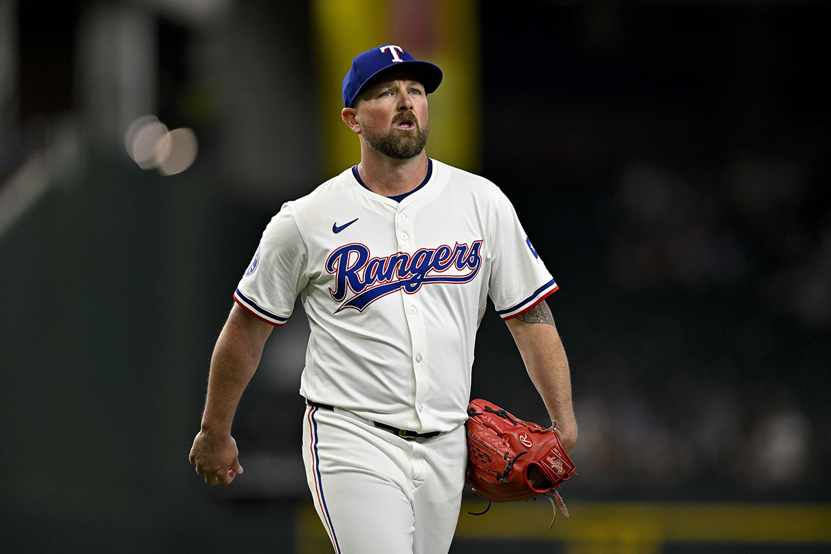 Texas Rangers relief pitcher Kirby Yates (39) walks off the field after he pitches against the Pittsburgh Pirates during the ninth inning at Globe Life Field. 