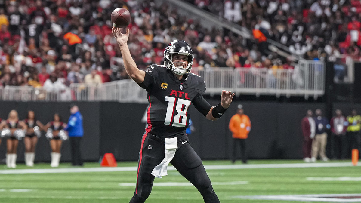 Atlanta Falcons quarterback Kirk Cousins (18) throws a touchdown pass to tight end Kyle Pitts (8) (not pictured) against the Pittsburgh Steelers during the first half at Mercedes-Benz Stadium