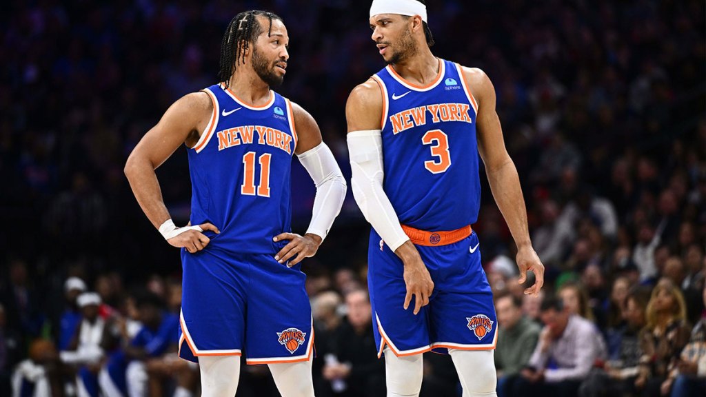 New York Knicks guard Jalen Brunson (11) reacts with guard Josh Hart (3) against the Philadelphia 76ers in the second quarter at Wells Fargo Center. 