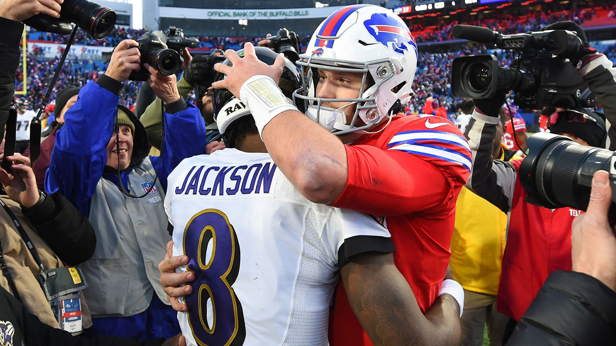 Baltimore Ravens quarterback Lamar Jackson (8) and Buffalo Bills quarterback Josh Allen (17) embrace following the game at New Era Field.