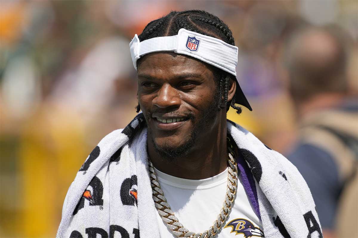 Baltimore Ravens quarterback Lamar Jackson walks to the locker room prior to halftime of the game against the Green Bay Packers at Lambeau Field.